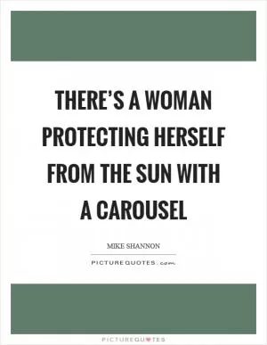 There’s a woman protecting herself from the sun with a carousel Picture Quote #1